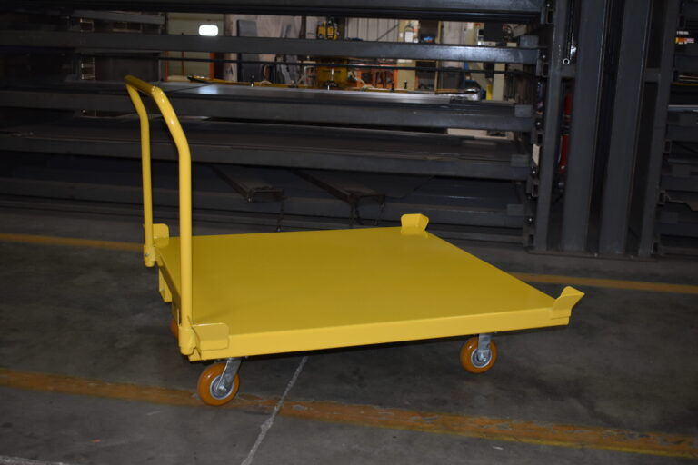 Z33-003-202 steel push cart with corner retaining lips holding a crate of auto components