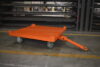 Z53-001-075 quad steer trailer towing a pallet across a food production floor